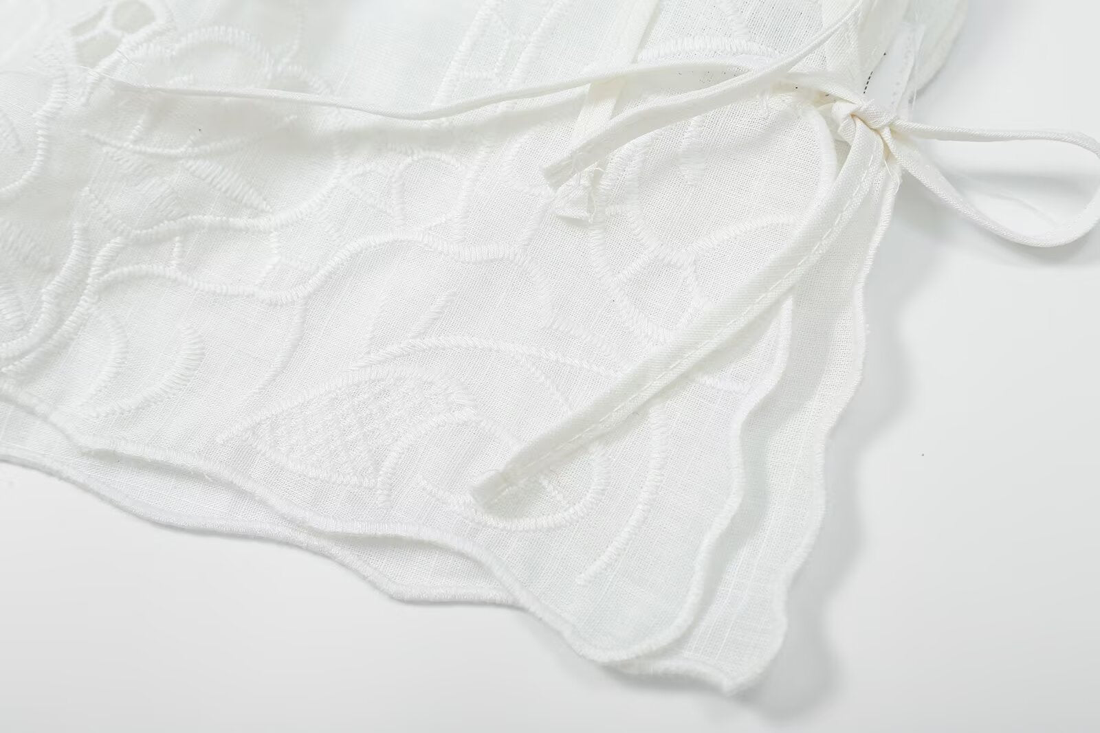 Women's bow decoration hollow embroidery top