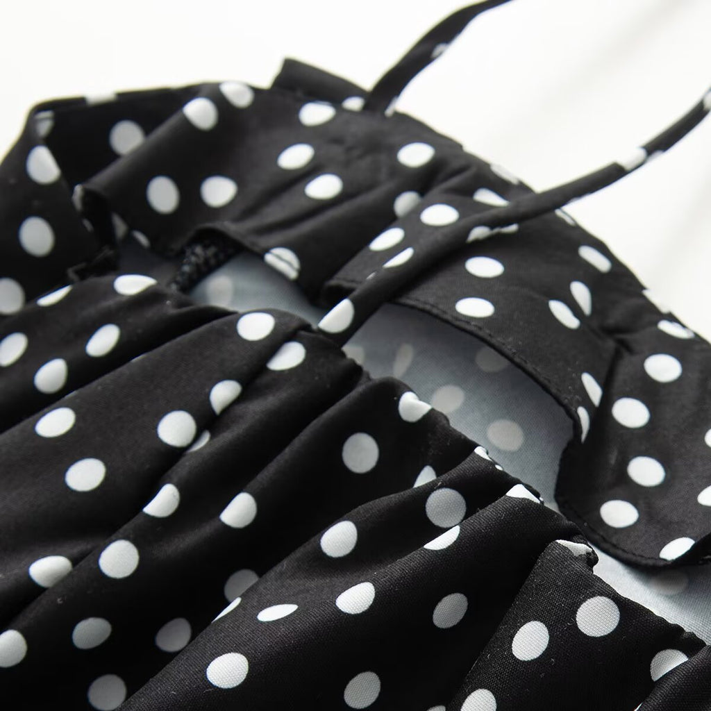 Women's sleeveless polka dot suspender dress