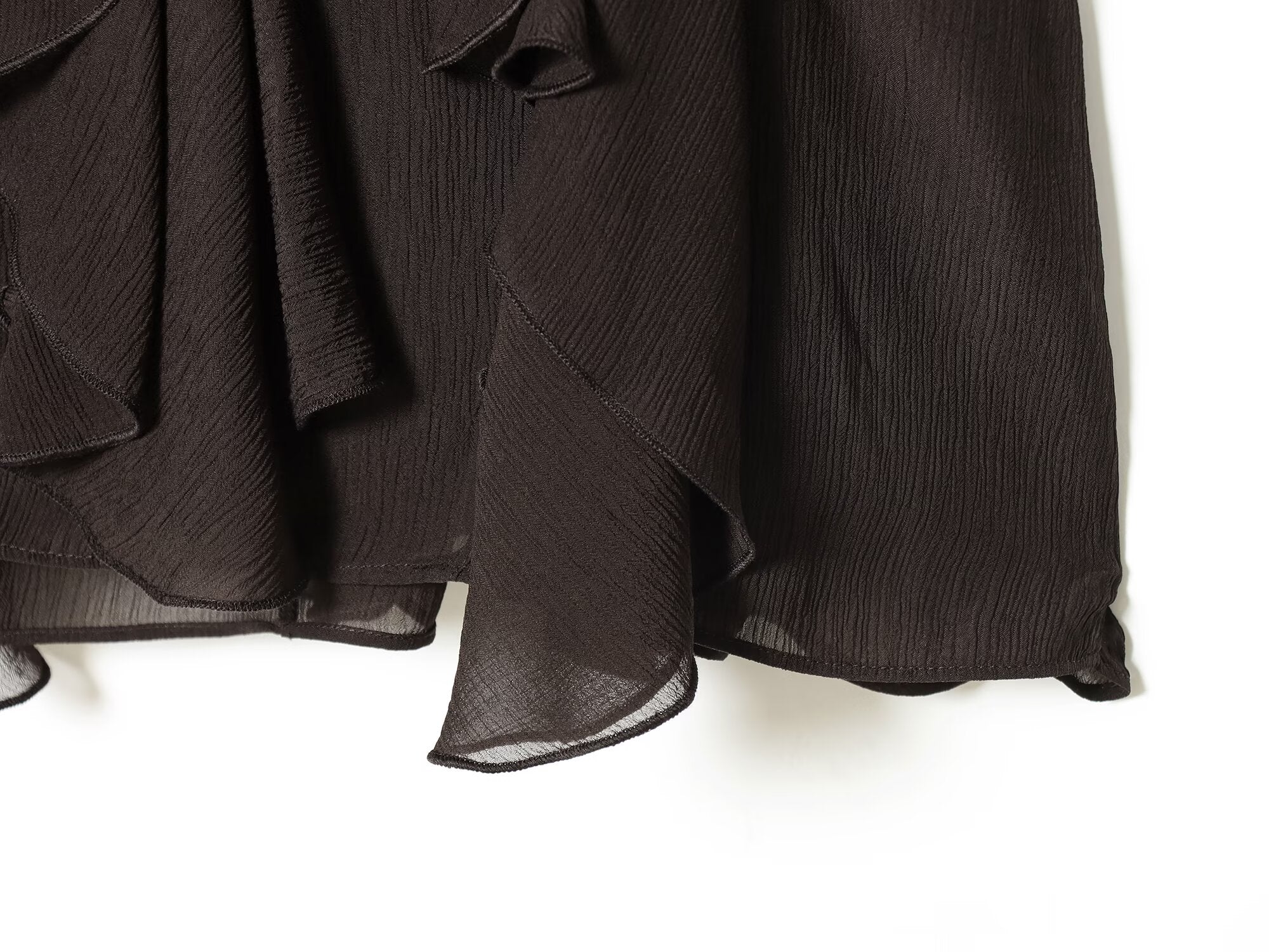 Women's asymmetrical ruffle edge draped mini skirt