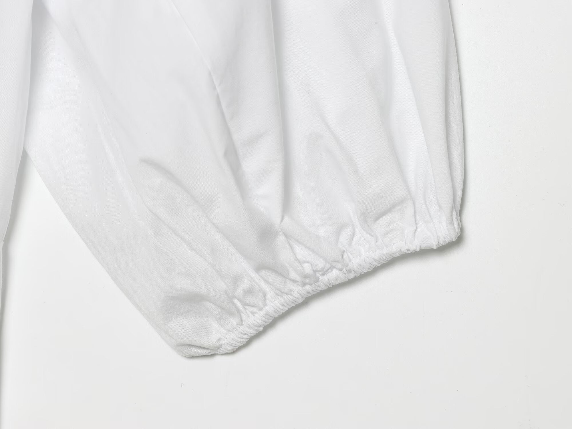 Women's skirt style hem bubble sleeve shirt