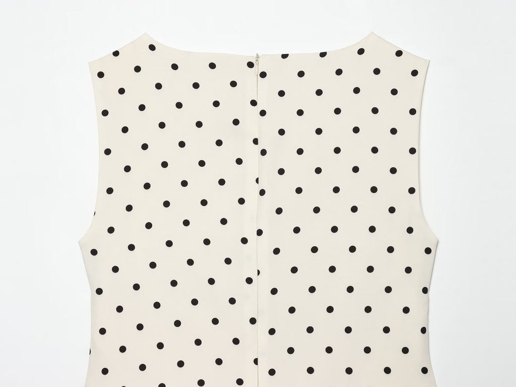 Women's ruffled hem polka dot sleeveless top