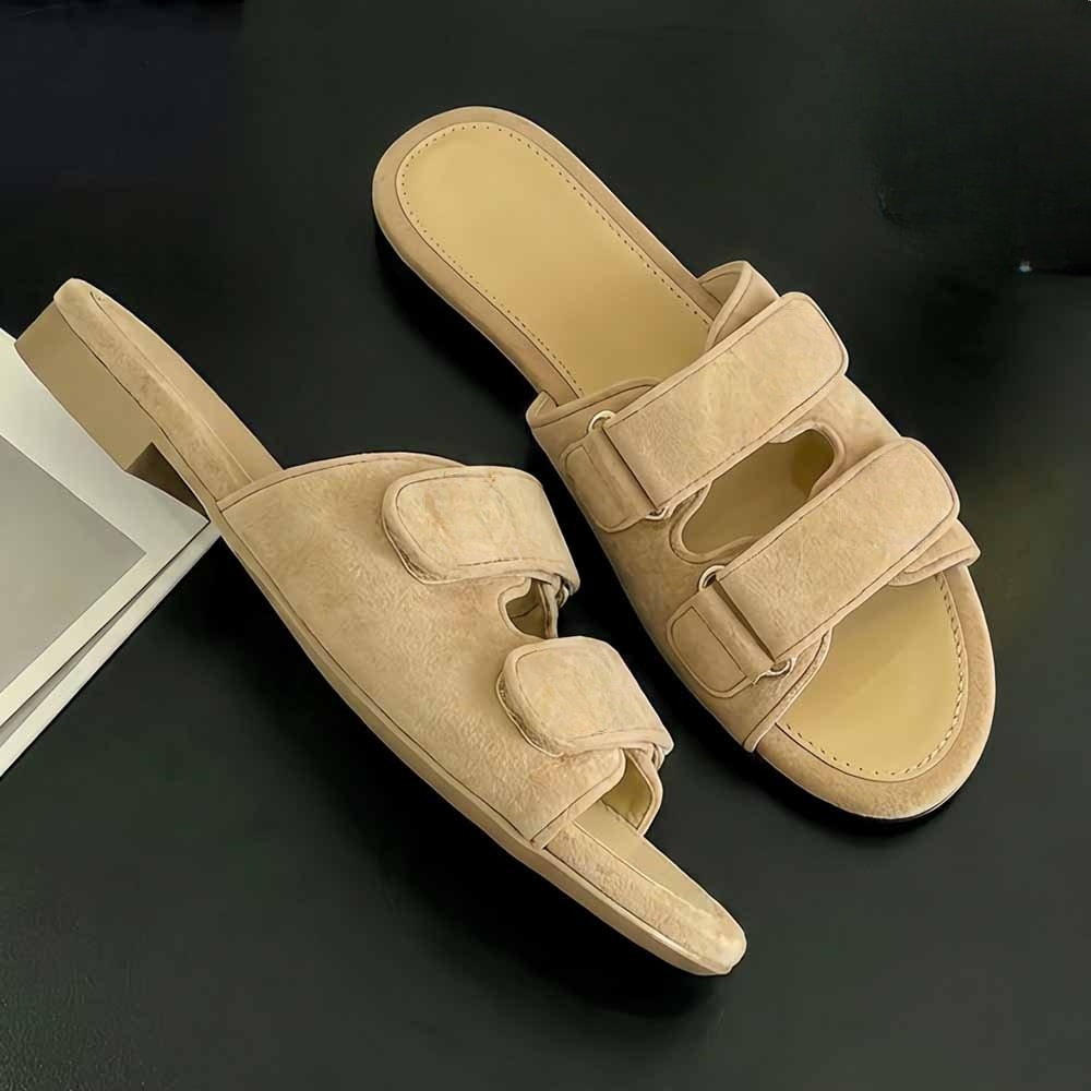 Women's new hook and loop slippers have a shoe box.