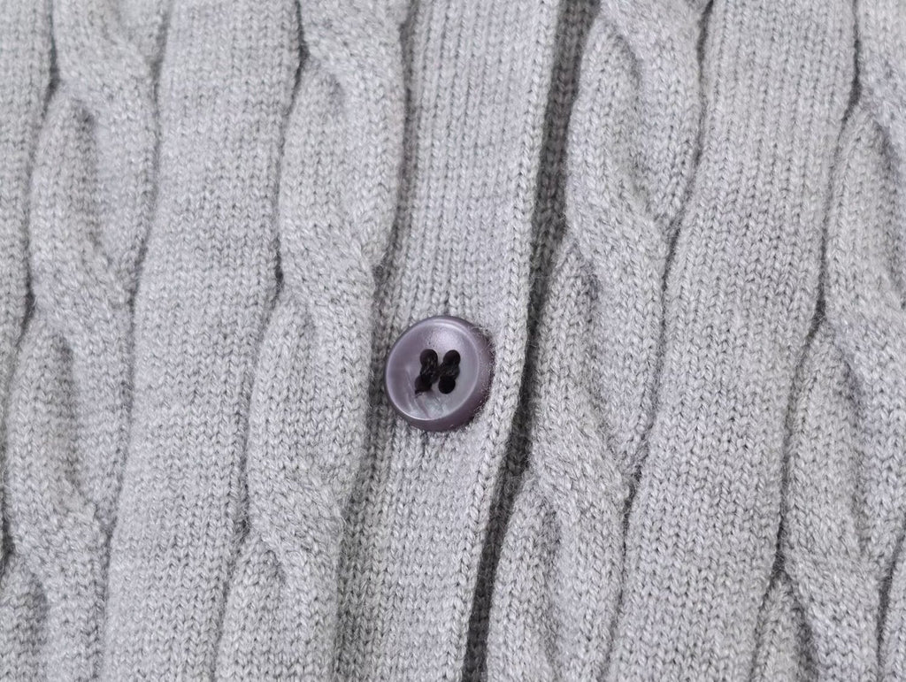 Women's contrasting spliced twisted checkered knit sweater