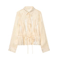 Women's metallic effect paired with belt shirt