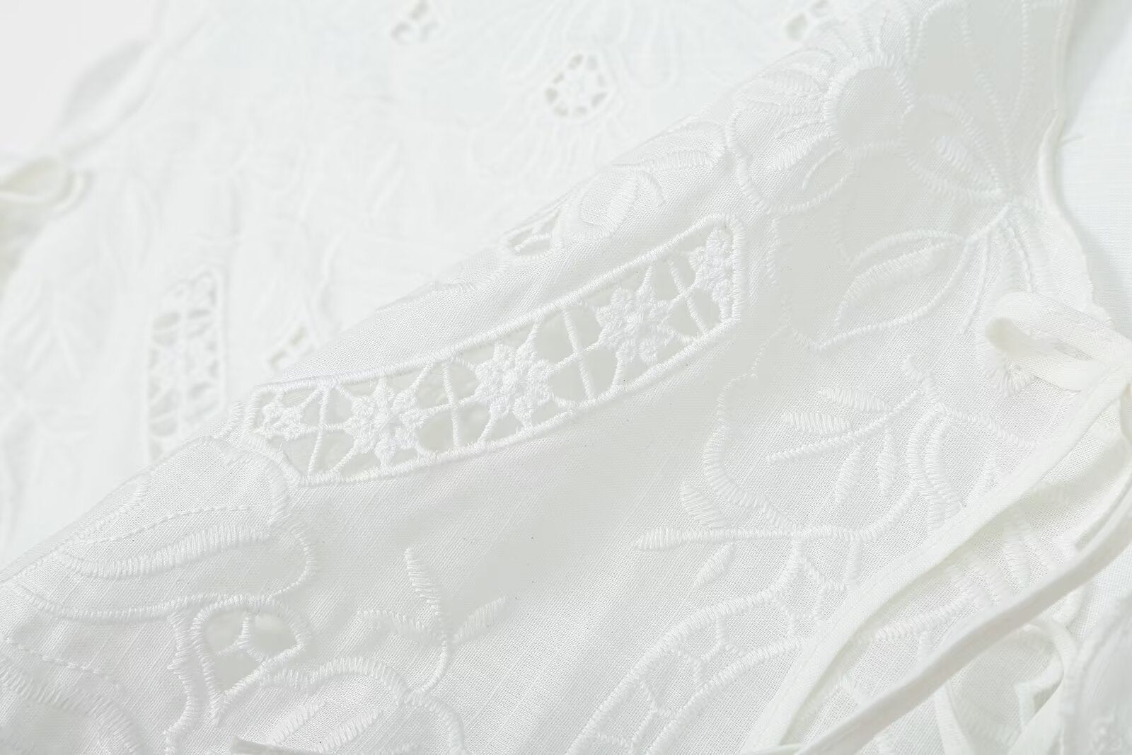Women's bow decoration hollow embroidery top