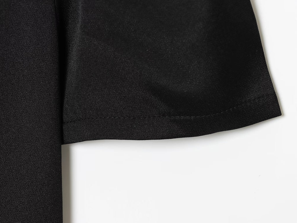 Women's black short sleeved pleated mini dress