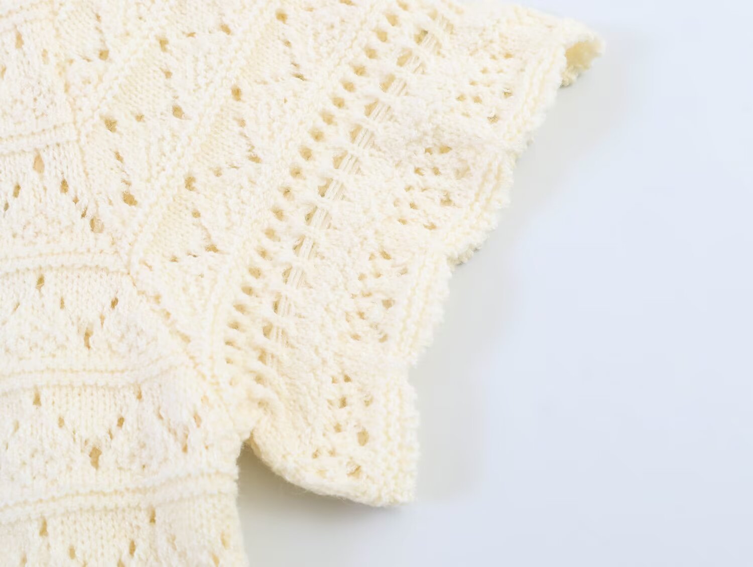 Women's round neck hollow knitted Coat