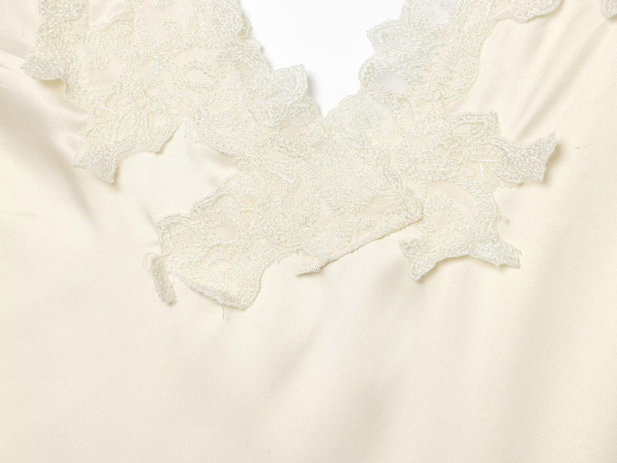 Women's lace decorated satin textured bodysuit
