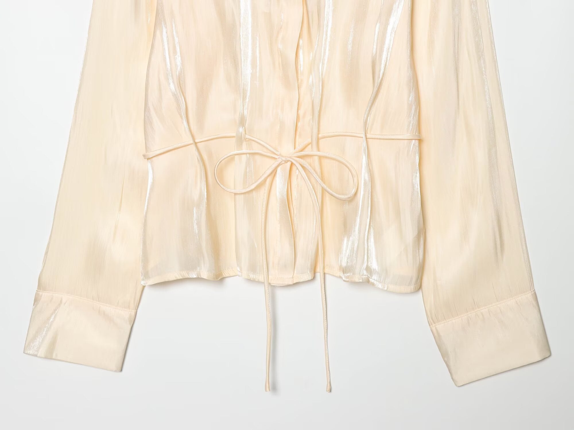 Women's metallic effect paired with belt shirt