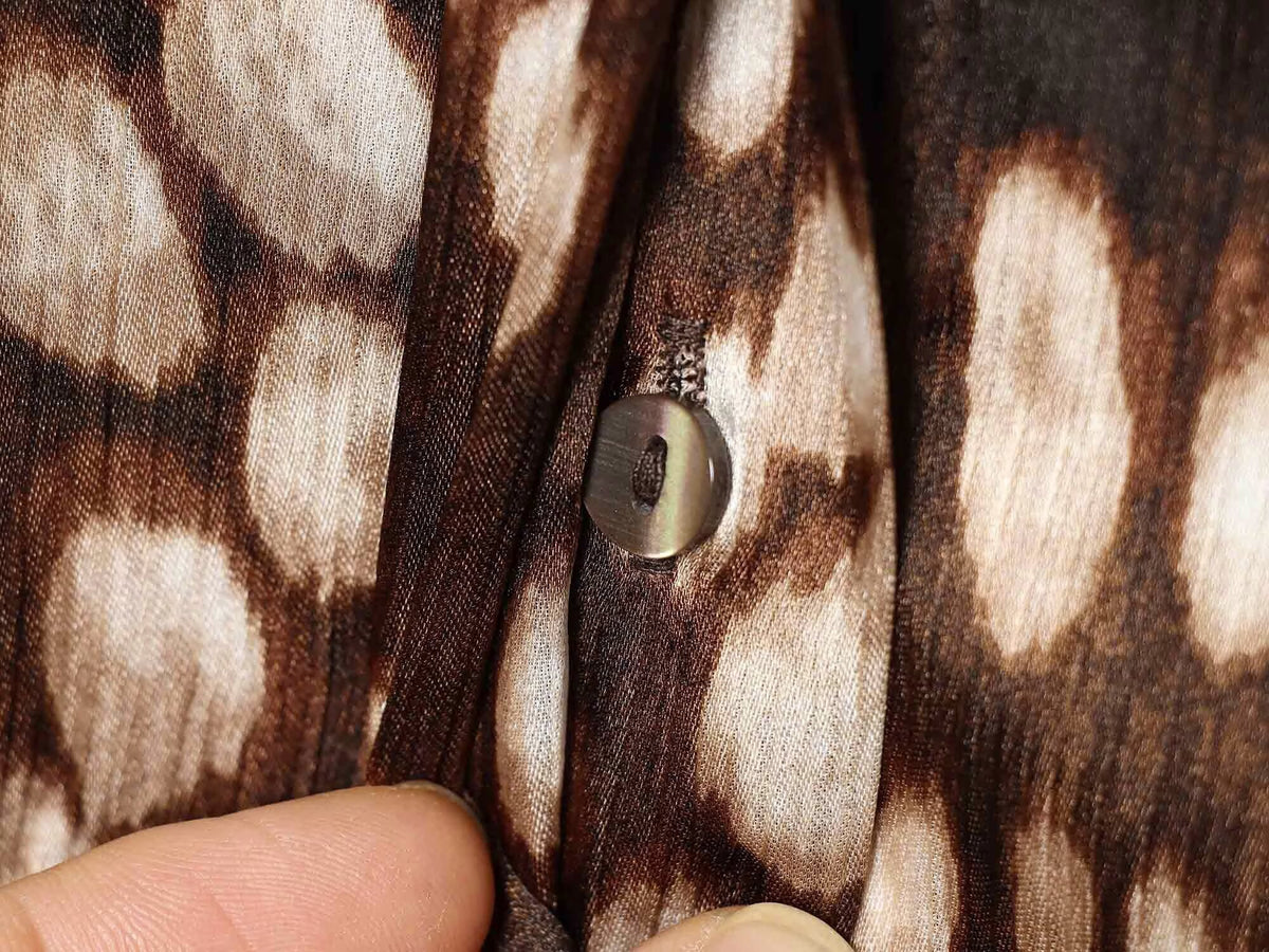 Women's spotted print lapel button top