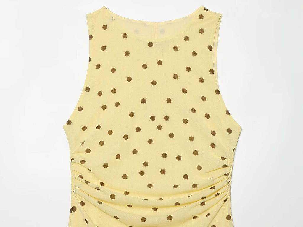 Women's sleeveless polka dot draped dress